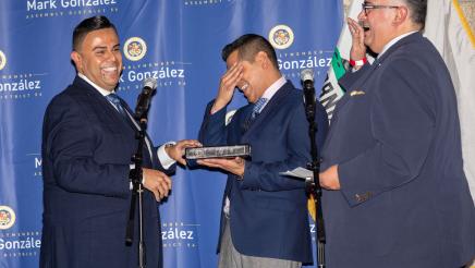 Asm. González sharing a light moment with Speaker Emeritus Pérez and former assemblymember Miguel Santiago