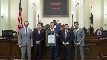 Asm. González, Speaker Rivas and others honoring Richard Ayoub on the Assembly Floor