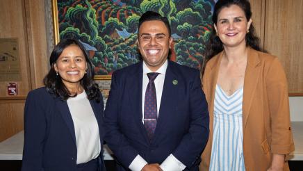 Asm. González with fellow speaker and attendee