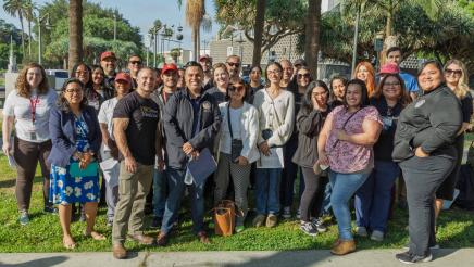 Group photo of Asm. González, guest speakers and many attendees