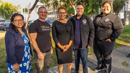Group photo of Asm. González, Mayor Bass and guest speakers